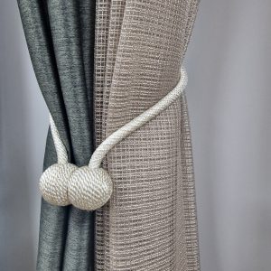 Beige gordijnvasthouder